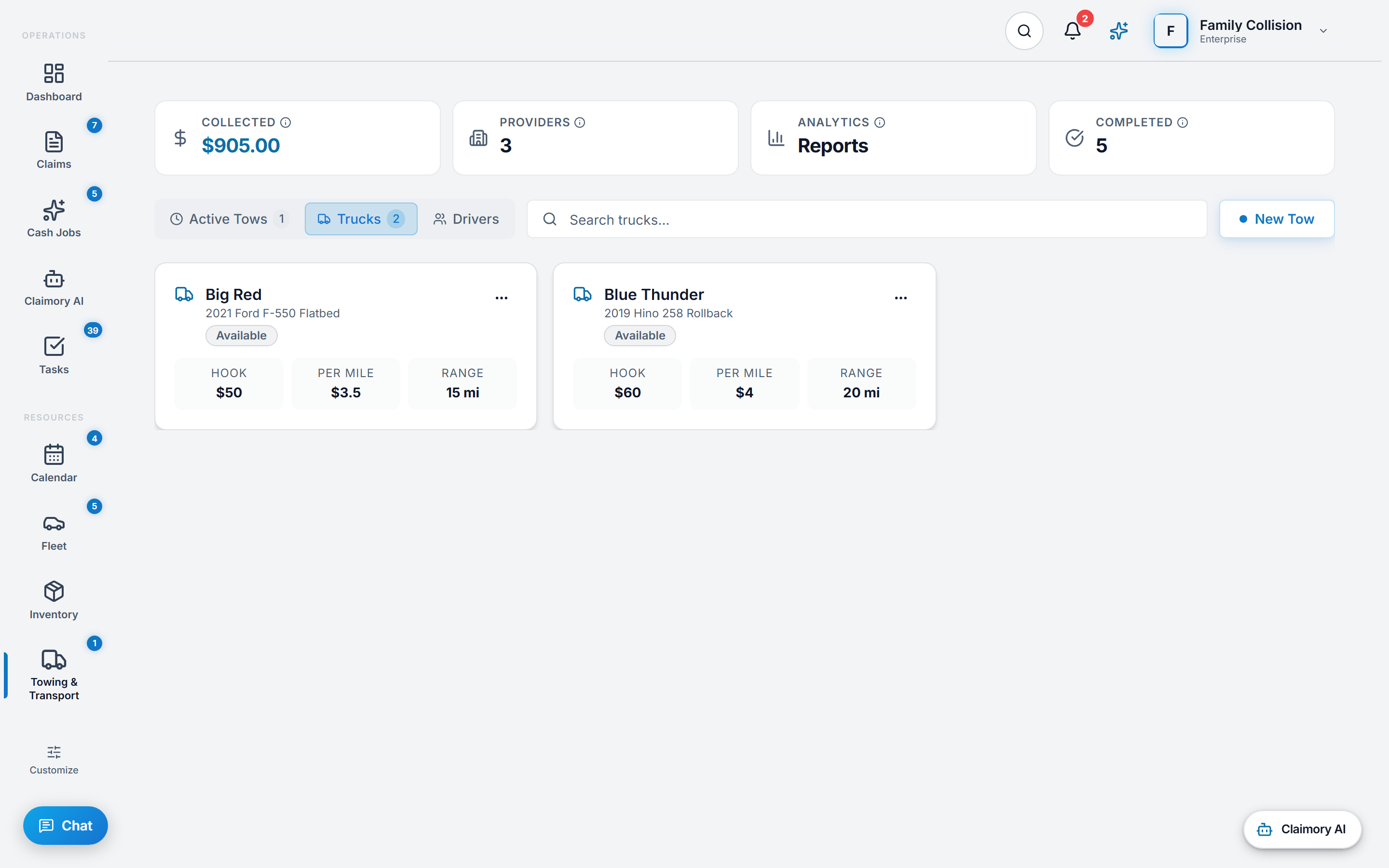 The in-house tow truck list in Claimory, showing two trucks with their year, make and model, an availability badge, and each truck's own rate card of base hook fee, per-mile rate and coverage range in miles.