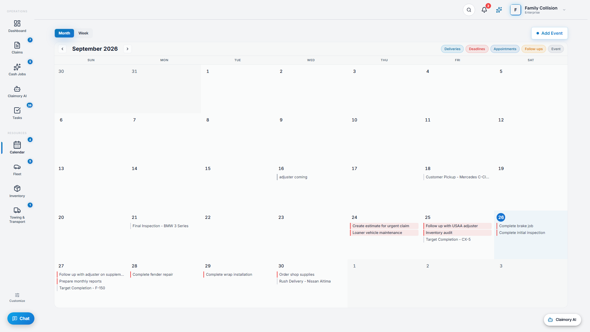 The Claimory calendar in month view, with color-coded deliveries, deadlines and customer appointments across the shop's schedule